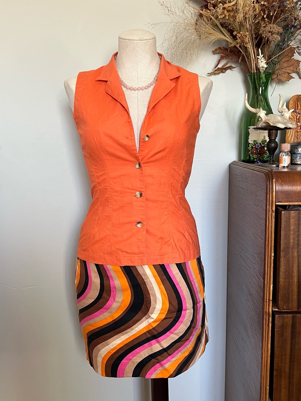 Sleeveless Orange Button-Front Top with Retro Wavy Skirt